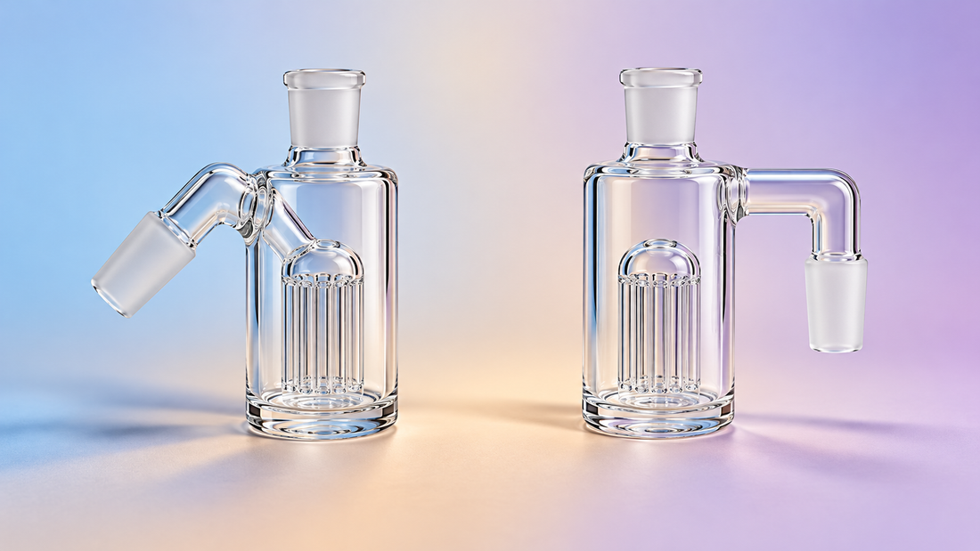 Two clear glass ash catchers with angled and right-angle connectors on a soft blue, sand and lilac background