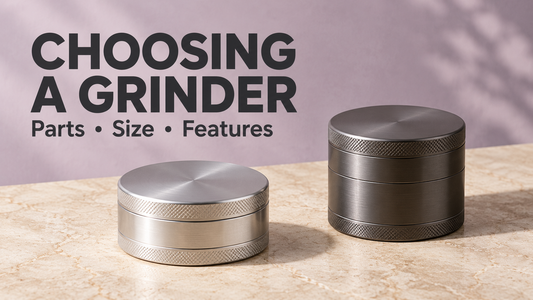 Illustration of two closed metal grinders on ivory stone against a muted lavender background